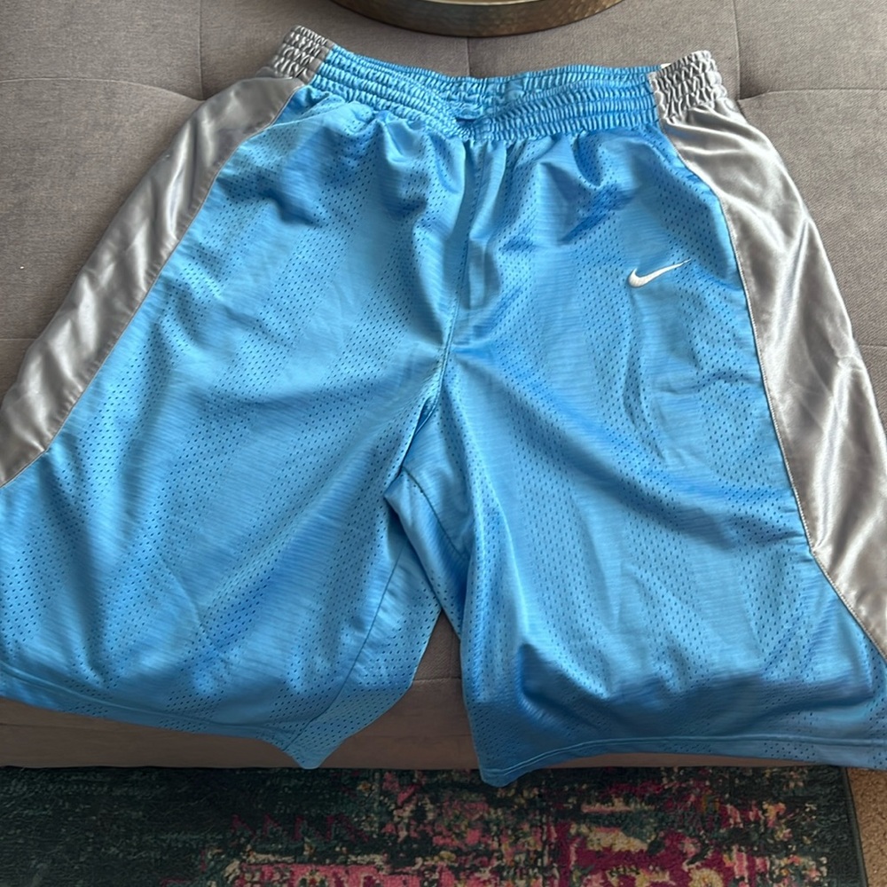 Nike men’s size large basketball shorts.